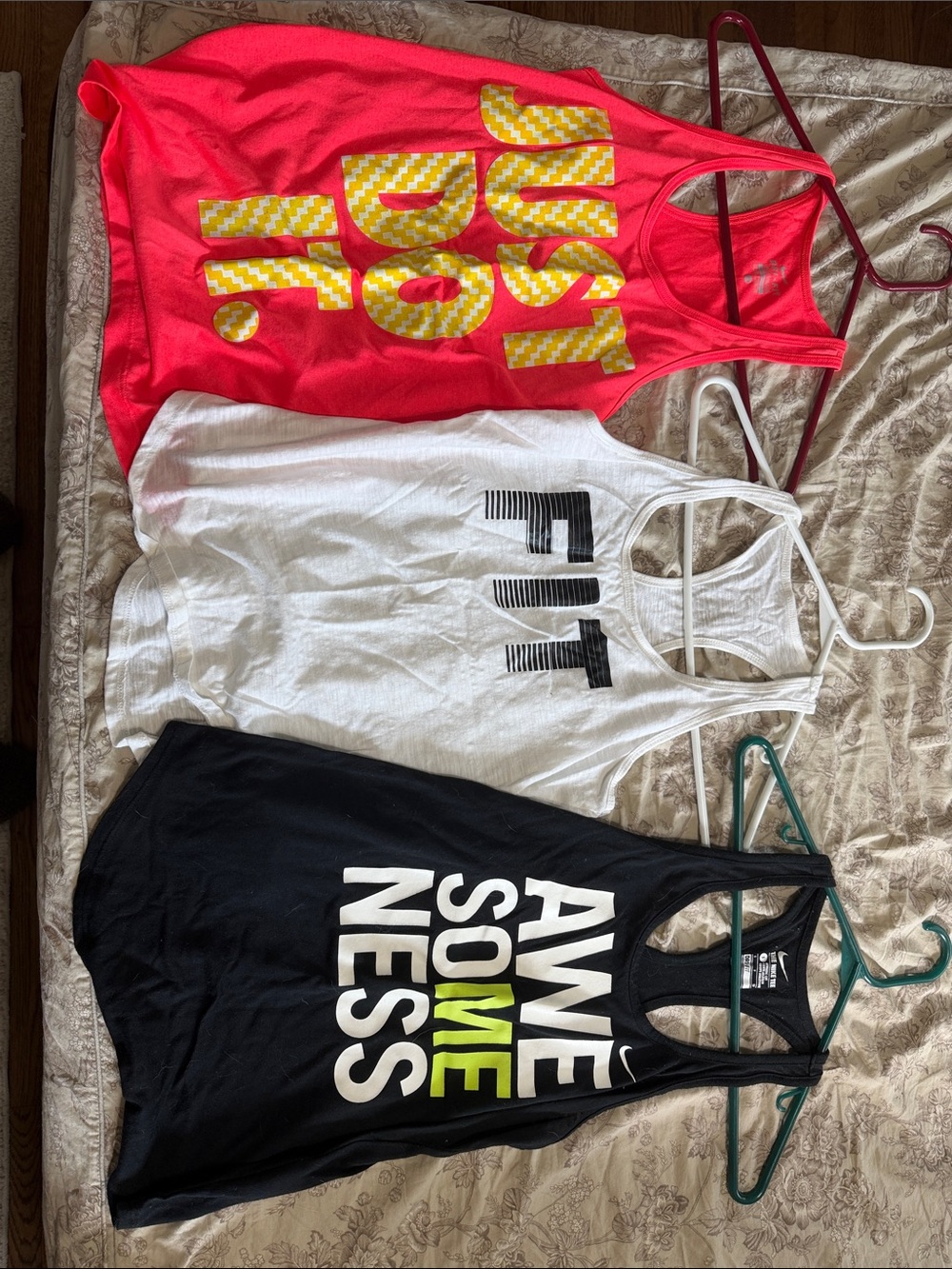 Two Nike brand race backs